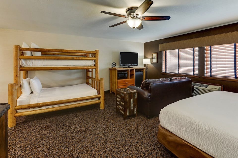 Unwind after adventures in cozy bunks and plush bedding.