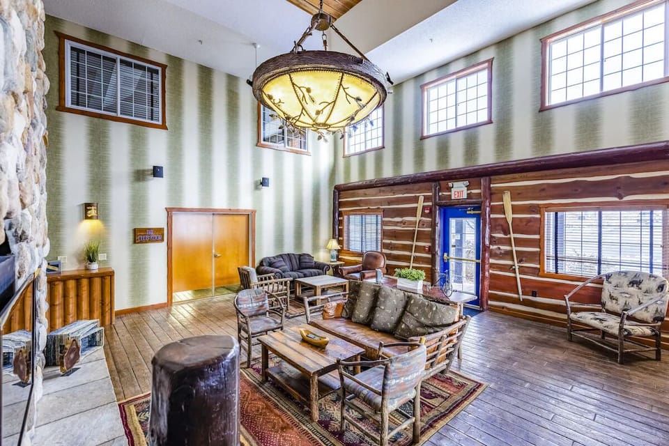 Gather with friends in a sunlit lodge lounge area.
