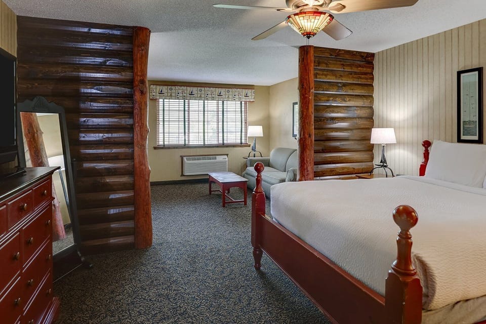 Settle into a cozy lodge-style bedroom with rustic charm.