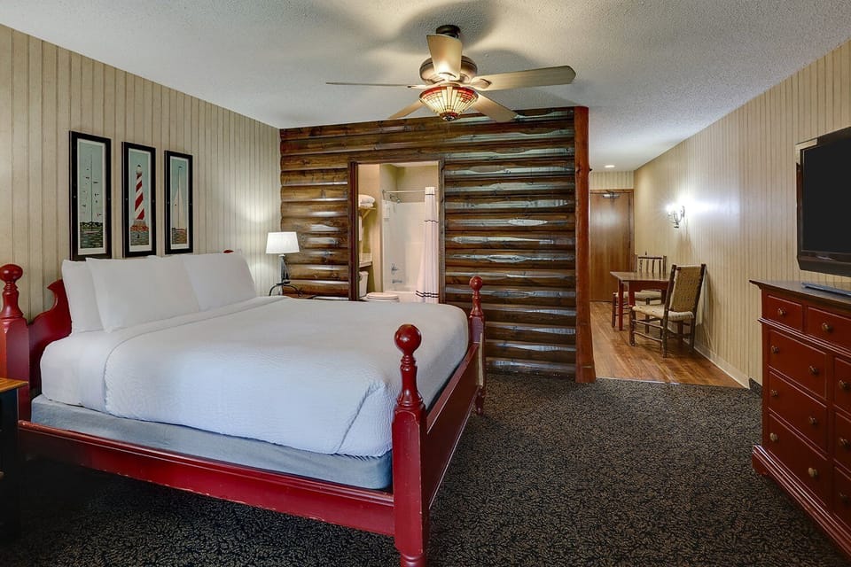 Wake refreshed in a rustic suite with lounge area nearby.