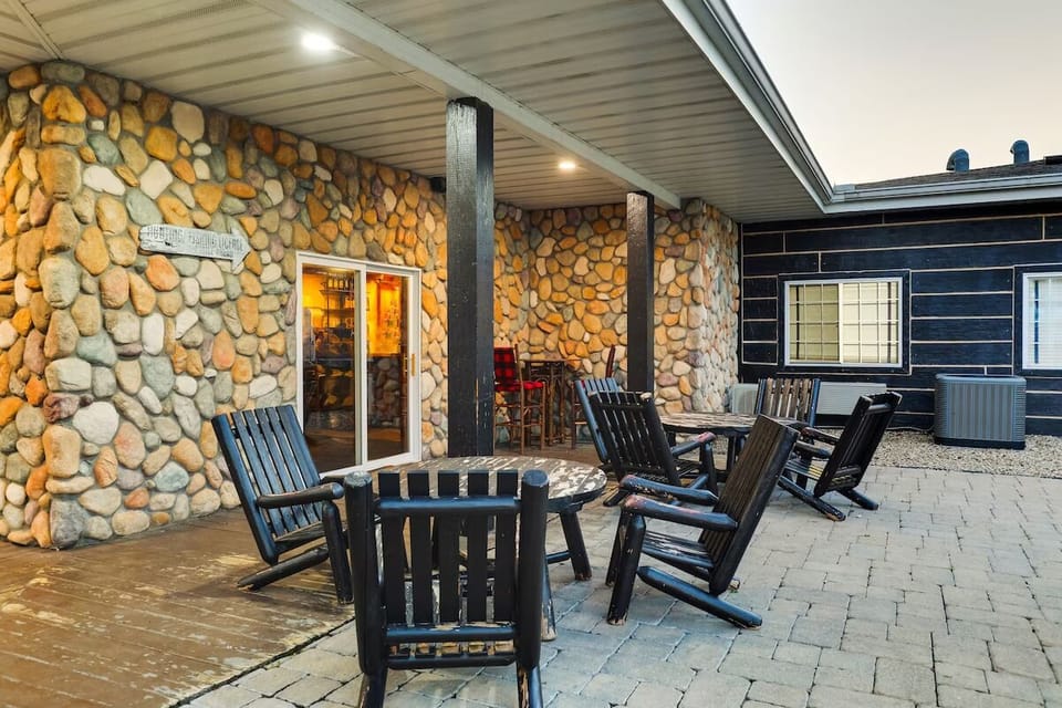 Gather with friends on the covered patio for cozy chats.