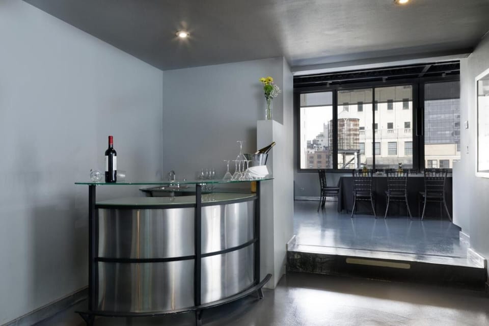 Gather for a nightcap at the sleek bar before dinner.