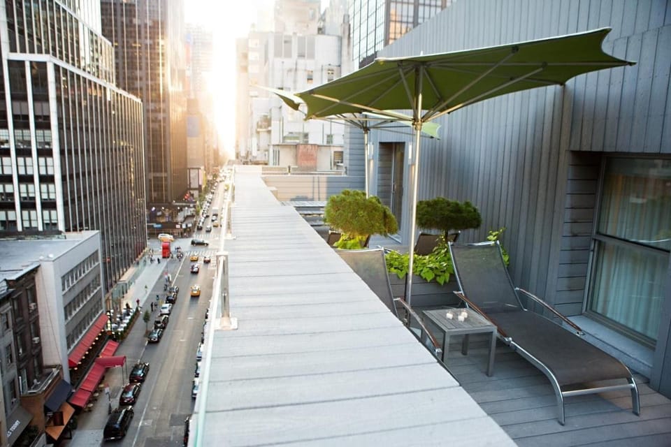 Sip morning coffee with sweeping street views from the terrace.