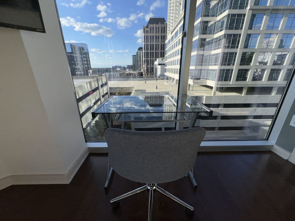 Stay productive in the stylish dedicated workspace featuring a modern desk setup perfect for remote work, studying, or planning your Atlanta adventures.