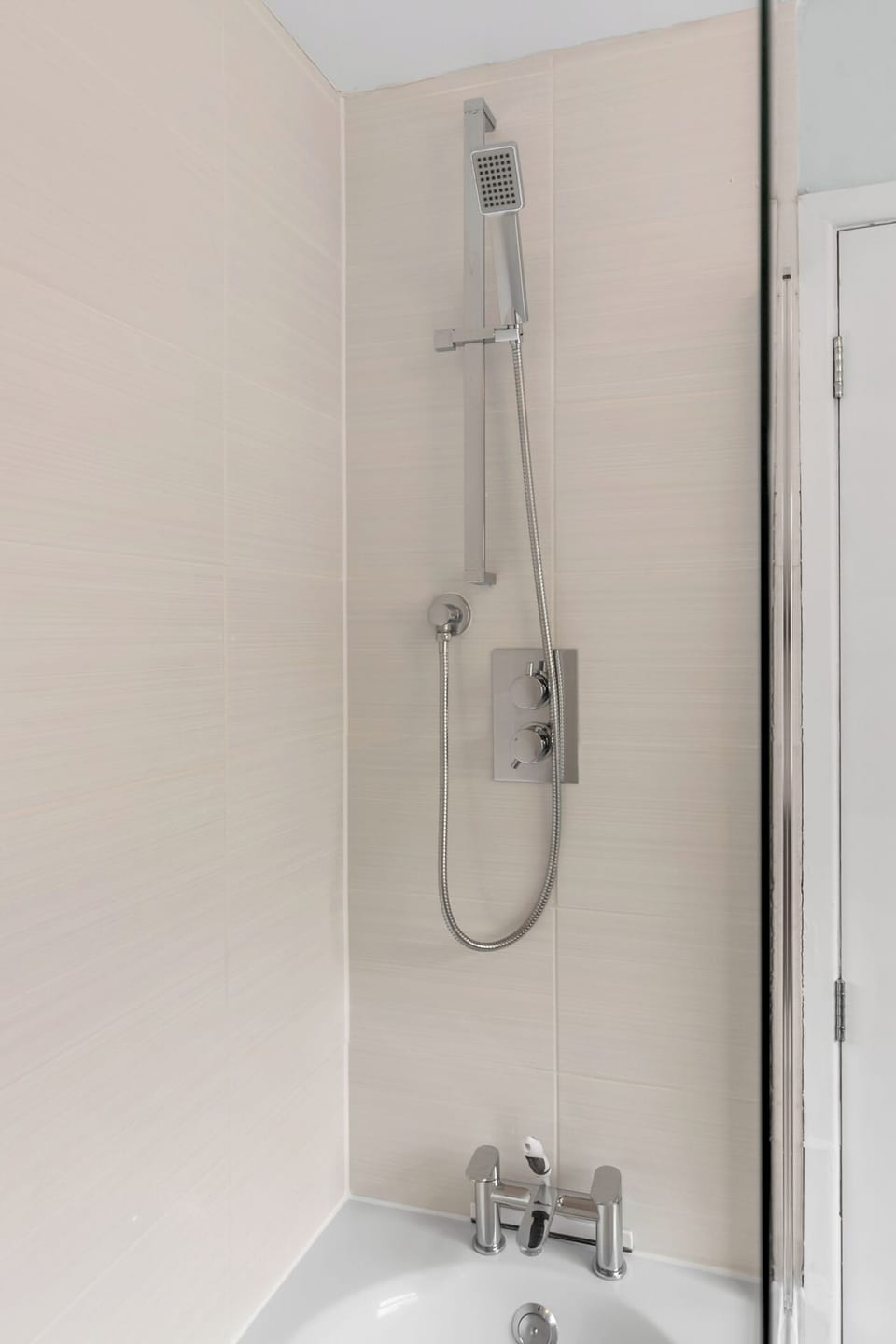 Indulge in a blissful cascade of water, washing away the day's stresses. Welcome to your private oasis where every shower is a spa-like experience.