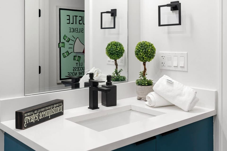 Fresh, clean bathroom with modern fixtures and hotel-style essentials.