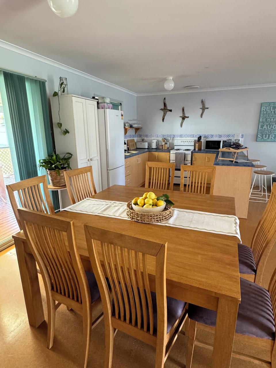 Open area for dining (seats 8), kitchen and lounge.