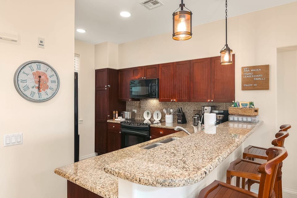 The fully equipped kitchen features modern appliances, ensuring you have everything needed for meal preparation.