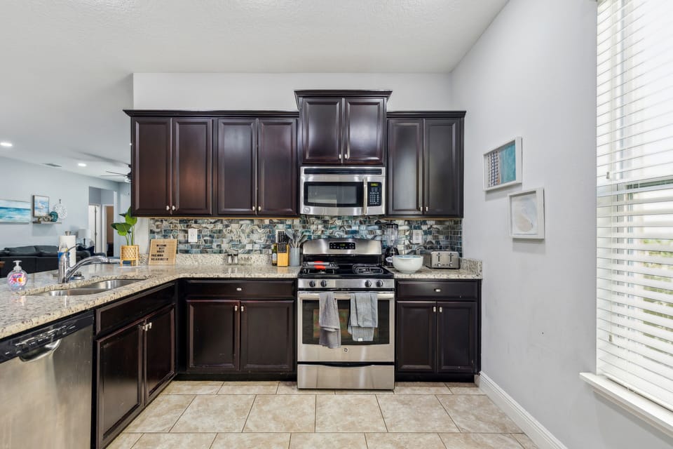 Fully equipped and spacious kitchen with ample cupboards