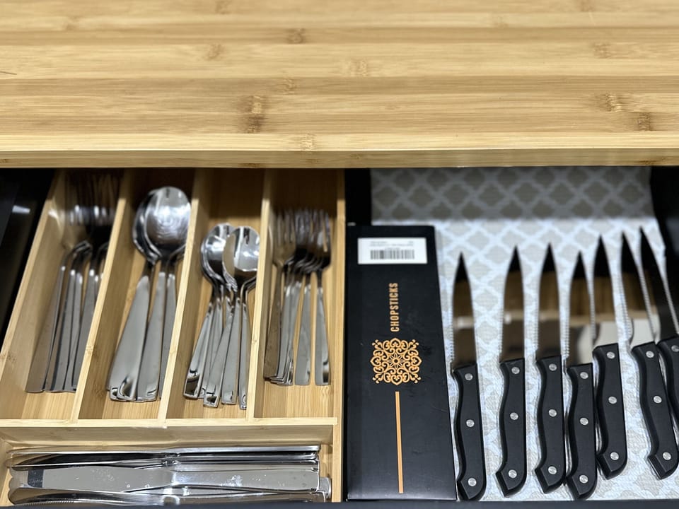 Fully equipped kitchen: Stocked with utensils and chopsticks for all your culinary adventures.