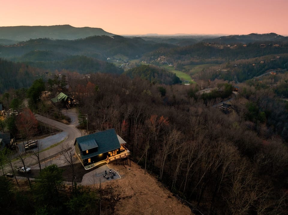 Experience breathtaking mountain views from your private deck, perfect for sunsets!