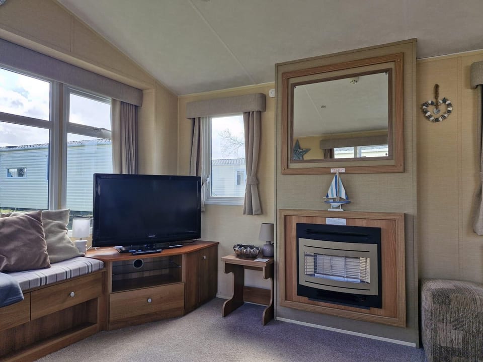 With the large windows natural light will flood in and you can sit back and enjoy the sun as you relax in the lounge.