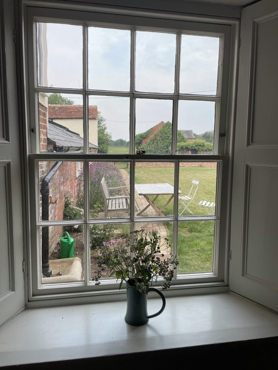 View through walled garden to open countryside from the kitchen