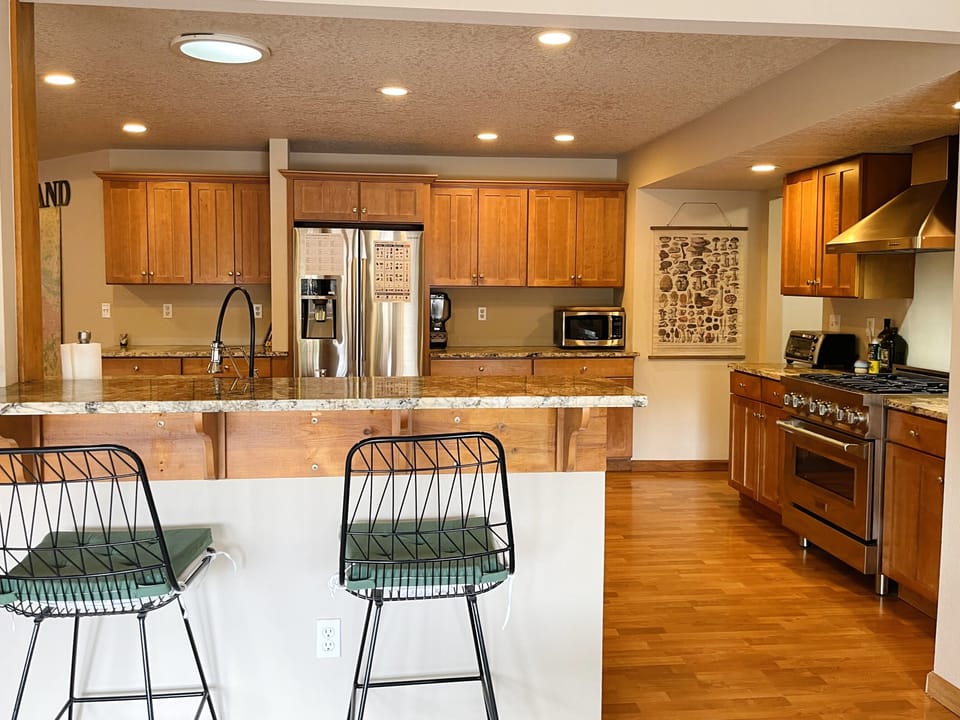 Kitchen with 2 hightop seats