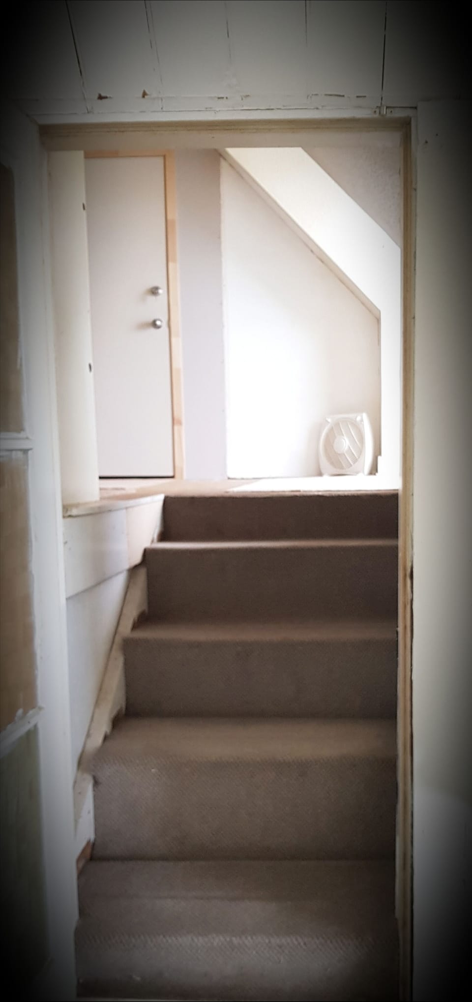 Half-flight of stairs from huge main upstairs bedroom, to attic bedroom