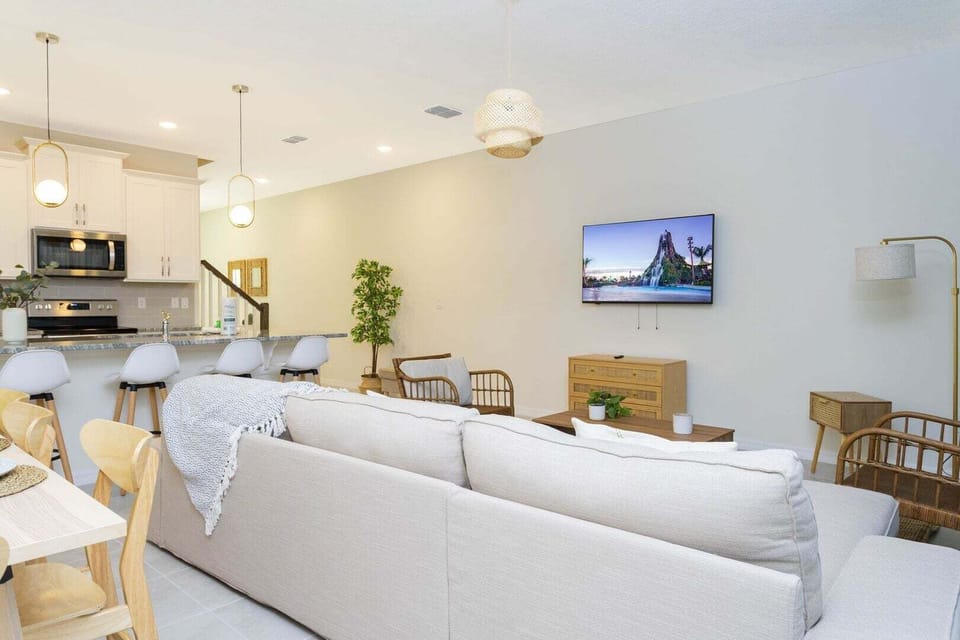 Enjoy a movie night in our living room with ample plush seating.