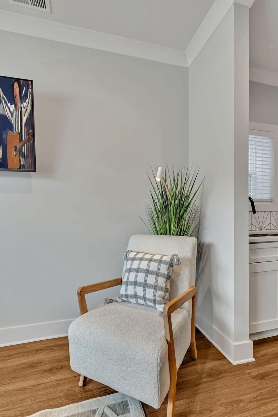 Warm and inviting living space designed to make you feel right at home with a Smart TV for entertainment and designer furnishings.