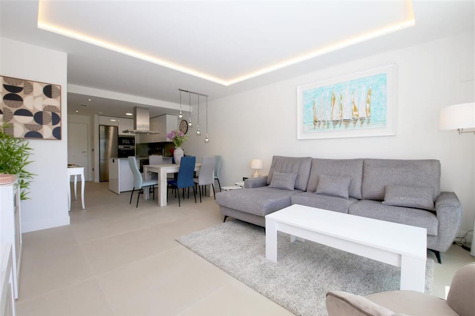 Full view of the lounge area with open kitchen to the rear