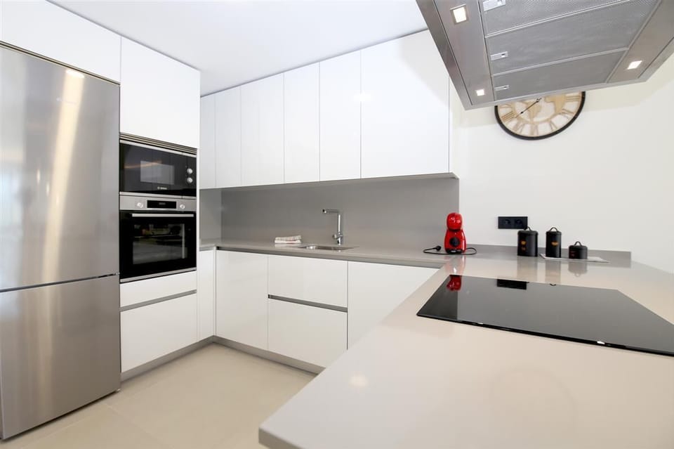 Another picture of the modern open kitchen with bar
