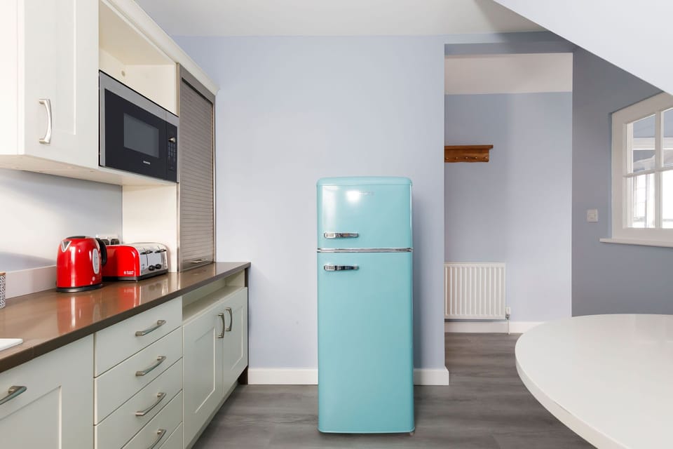 Cute fridge freezer and all other amenities