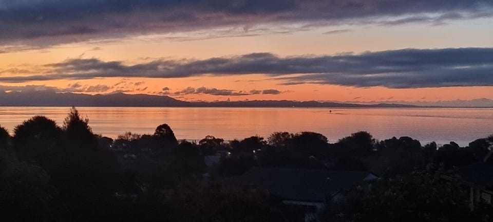A sublime sunset and a glass of something...?