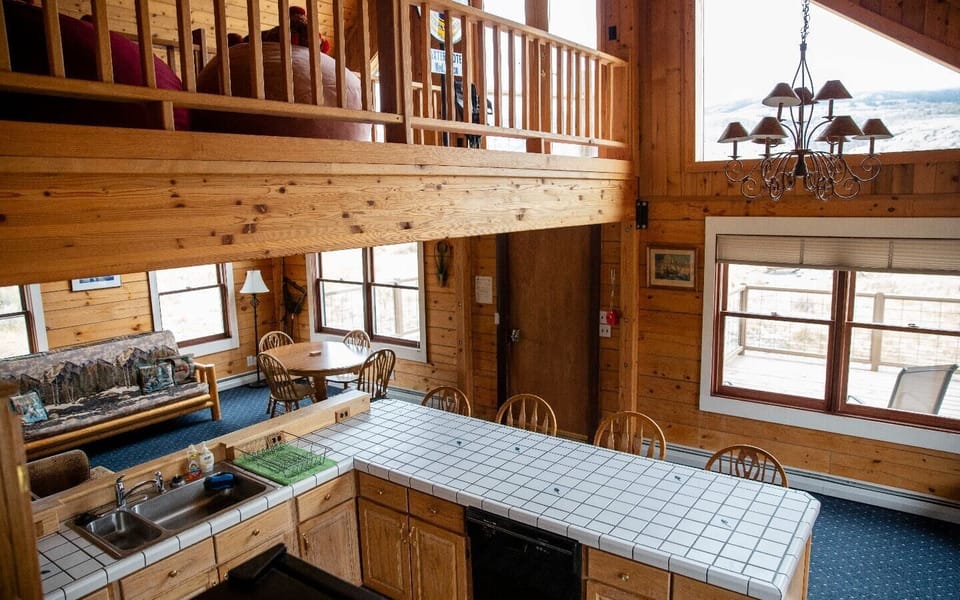 The main level also features the spacious living area and a view of the loft.