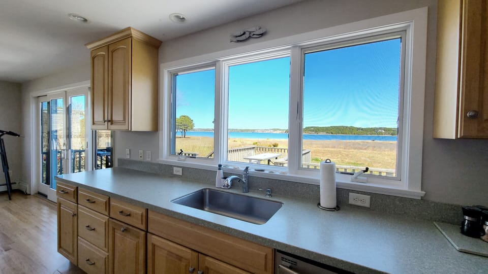 Nicely equipped kitchen with Chipman Cove views