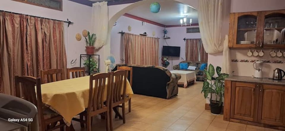 Large open plan L shaped kitchen, diner lounge.