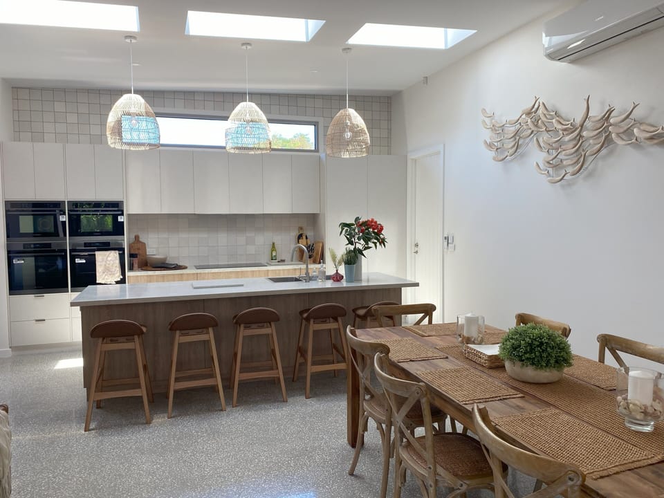 Kitchen and dining area with ample natural light.
