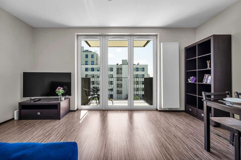 Comfortable Living Room with Sofa Bed and Smart TV | Book Now with RENTUJEMY