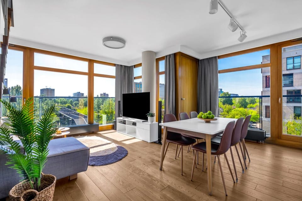 Comfortable Living Room with Sofa Bed and Smart TV | Book Now with RENTUJEMY