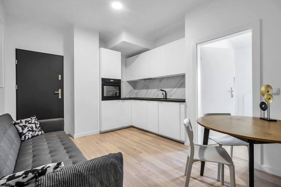 Comfortable Living Room with Sofa Bed and Smart TV | Book Now with RENTUJEMY