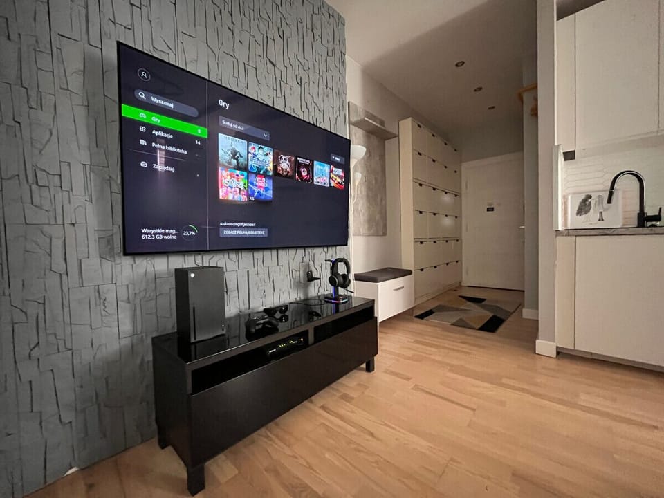 Main Living Area with a Smart TV- Book Now with RENTUJEMY.COM