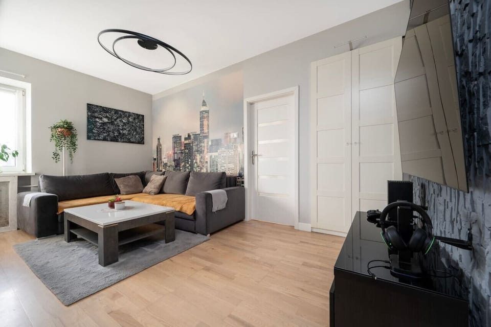 Main Living Area with a Smart TV- Book Now with RENTUJEMY.COM