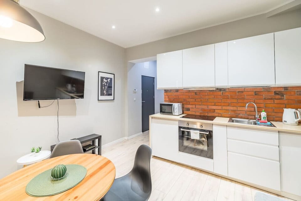 Comfortable Living Room with Sofa Bed and Smart TV | Book Now with RENTUJEMY
