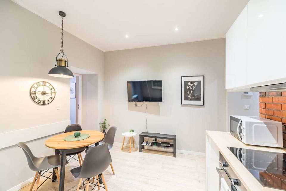 Comfortable Living Room with Sofa Bed and Smart TV | Book Now with RENTUJEMY