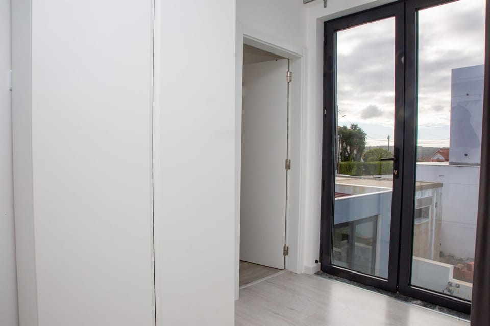 Closet and ensuite bathroom - primary