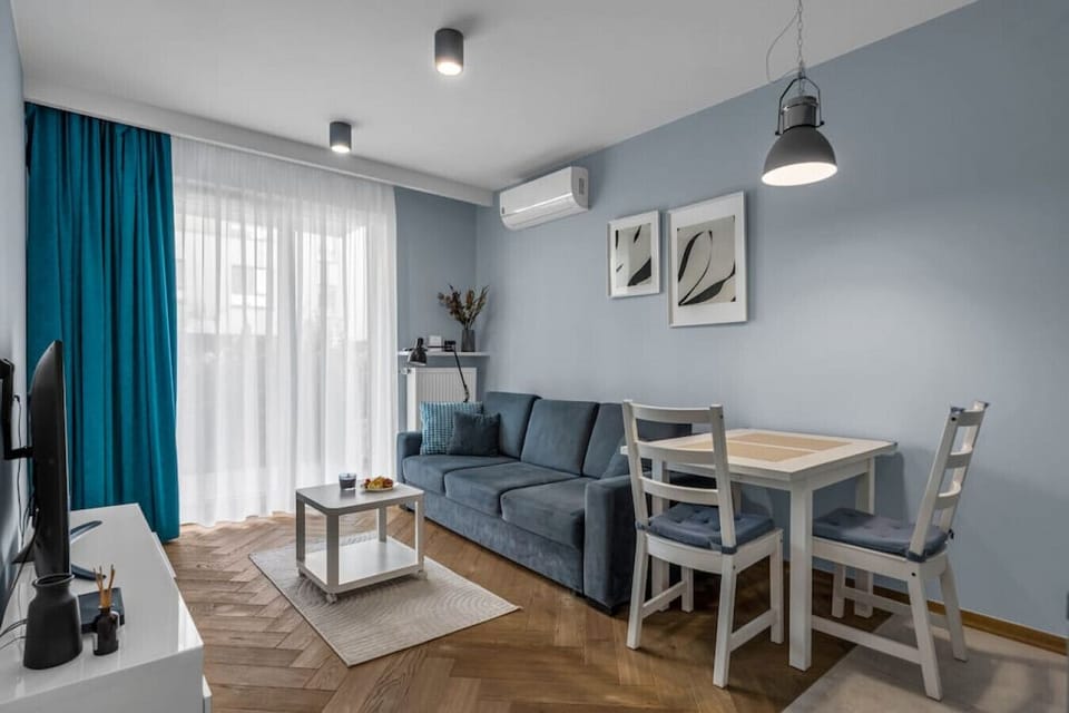Comfortable Living Room with Sofa Bed and Smart TV| Book Now With RENTUJEMY