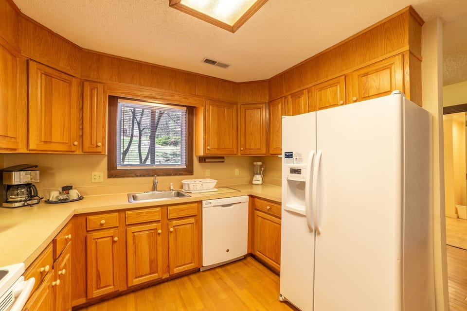 First level full kitchen equipped with basic cookware