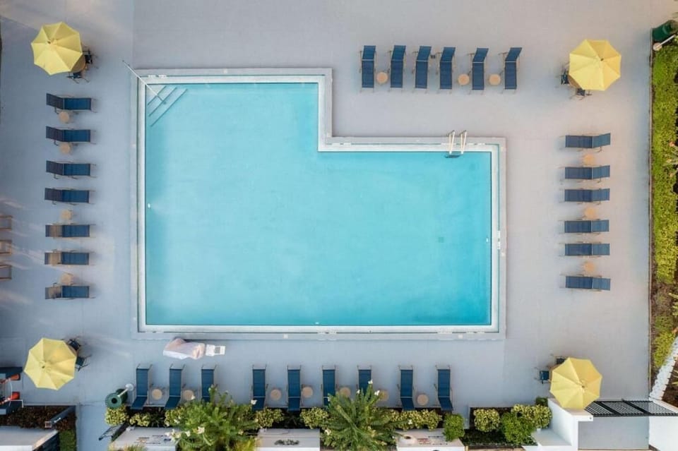 Picture lazy afternoons with plenty of loungers around the pool.