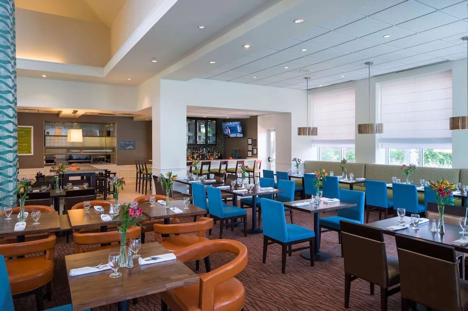 Linger over dinner in a bright, contemporary dining room.