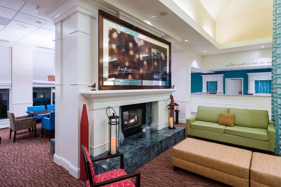 Unwind by the glowing fireplace in this stylish lounge.