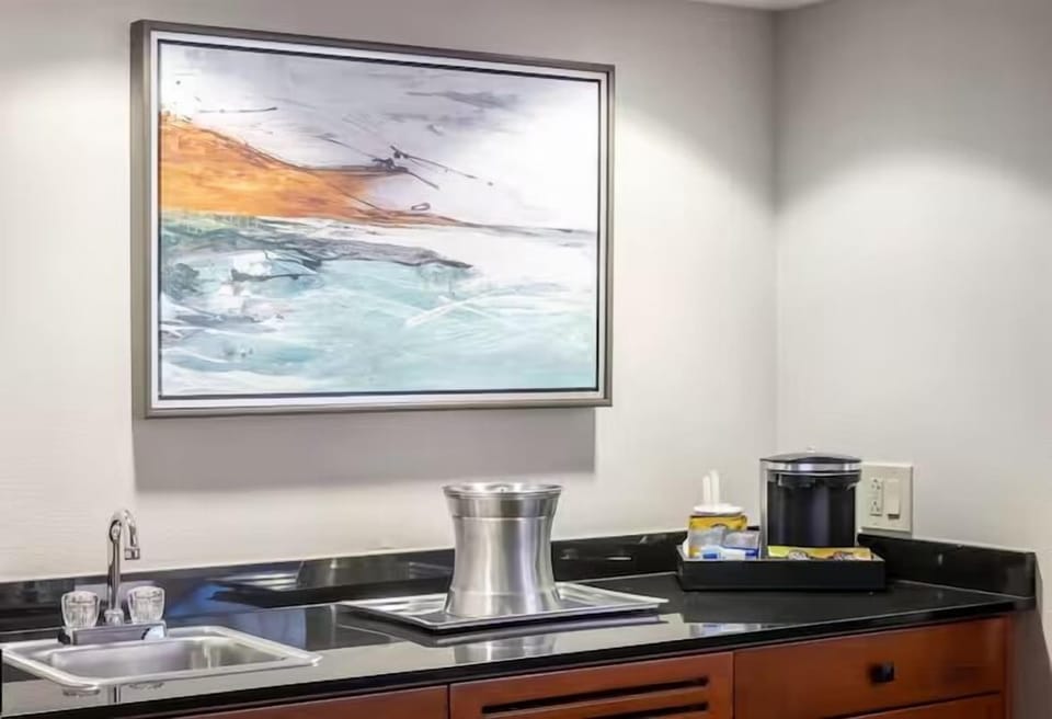 Refresh drinks and snacks at the convenient in-room wet bar.