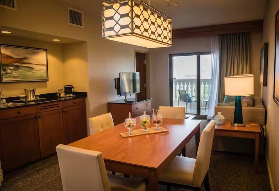 Gather for easy meals in the dining area beside kitchenette.
