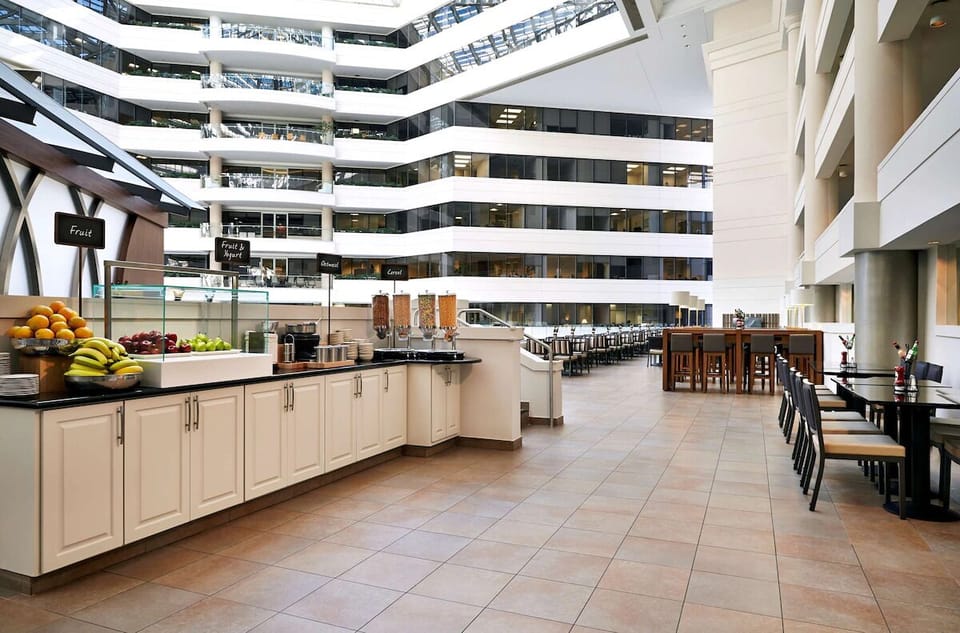 Fuel your day with bright breakfast spreads in a spacious atrium.