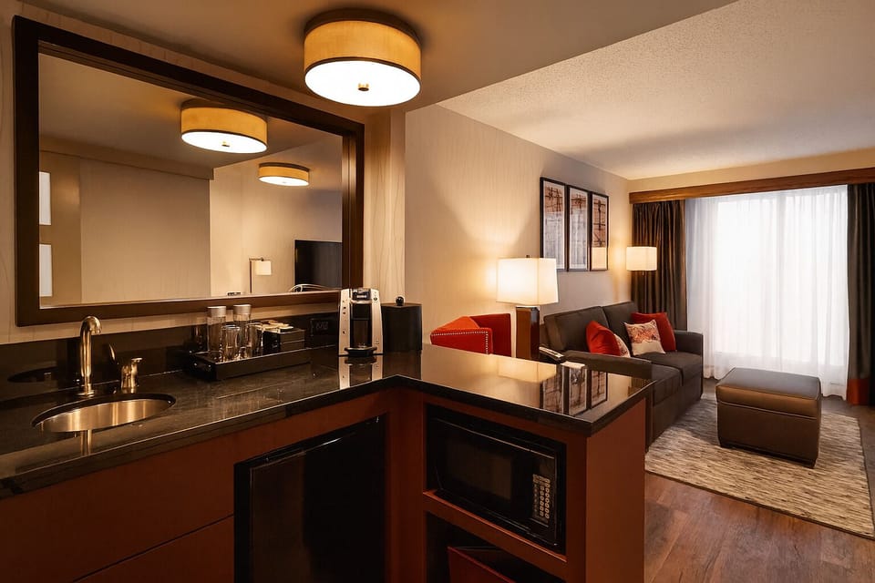Sip morning coffee at your in-suite kitchenette and wet bar.
