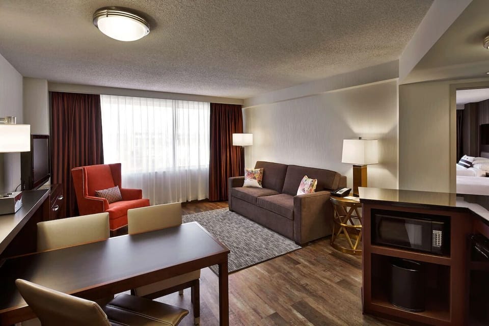 Gather comfortably for movies and meals in the roomy suite.