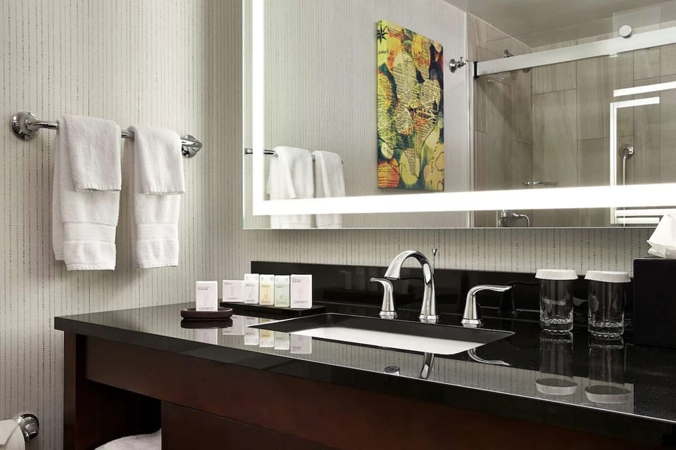 Get ready with a wide vanity and bright, flattering mirror.