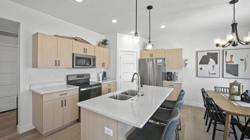 Whip up culinary delights with ease. Crimson Canyon Condo boasts a fully-equipped kitchen with a coffee maker, blender, griddle, crockpot, toaster, and an air fryer.