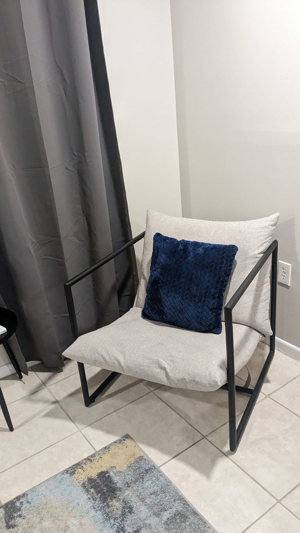 Relax in style with this chic sling chair while reading your favorite book.